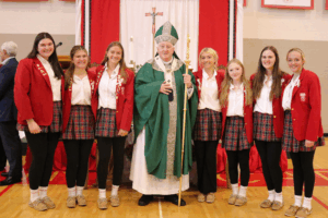 Ursuline Academy students with Archbishop Rozanski.